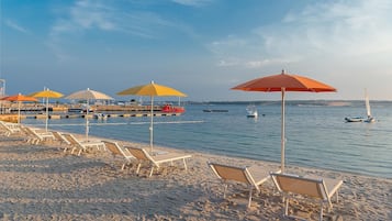 Beach towels, waterskiing, beach volleyball, beach bar