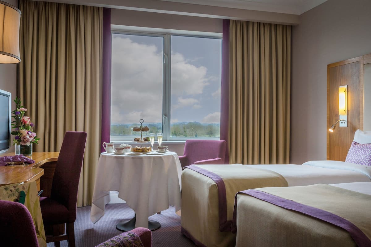 in-room safe, desk, blackout curtains, iron/ironing board