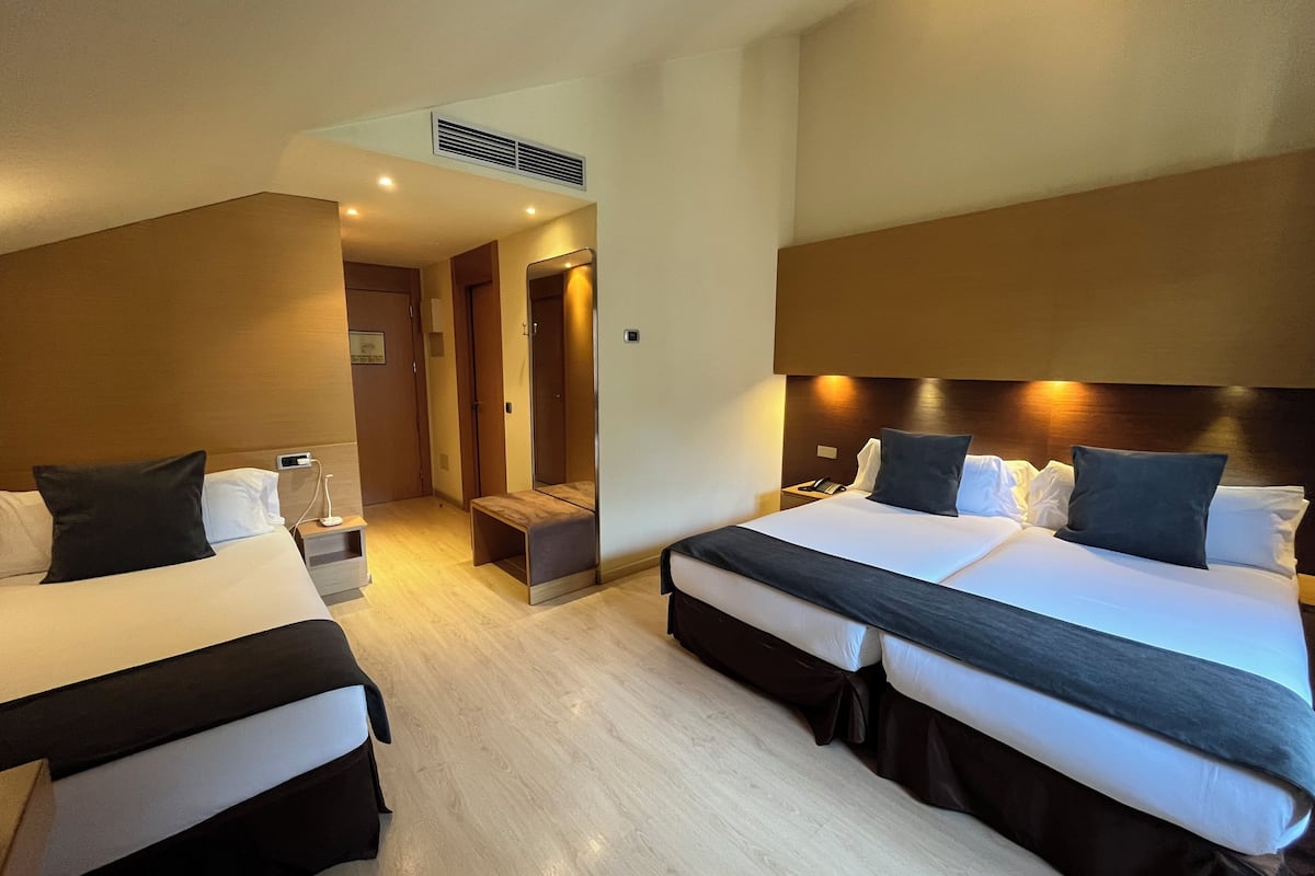 premium triple room | 1 bedroom, minibar, in-room safe, desk