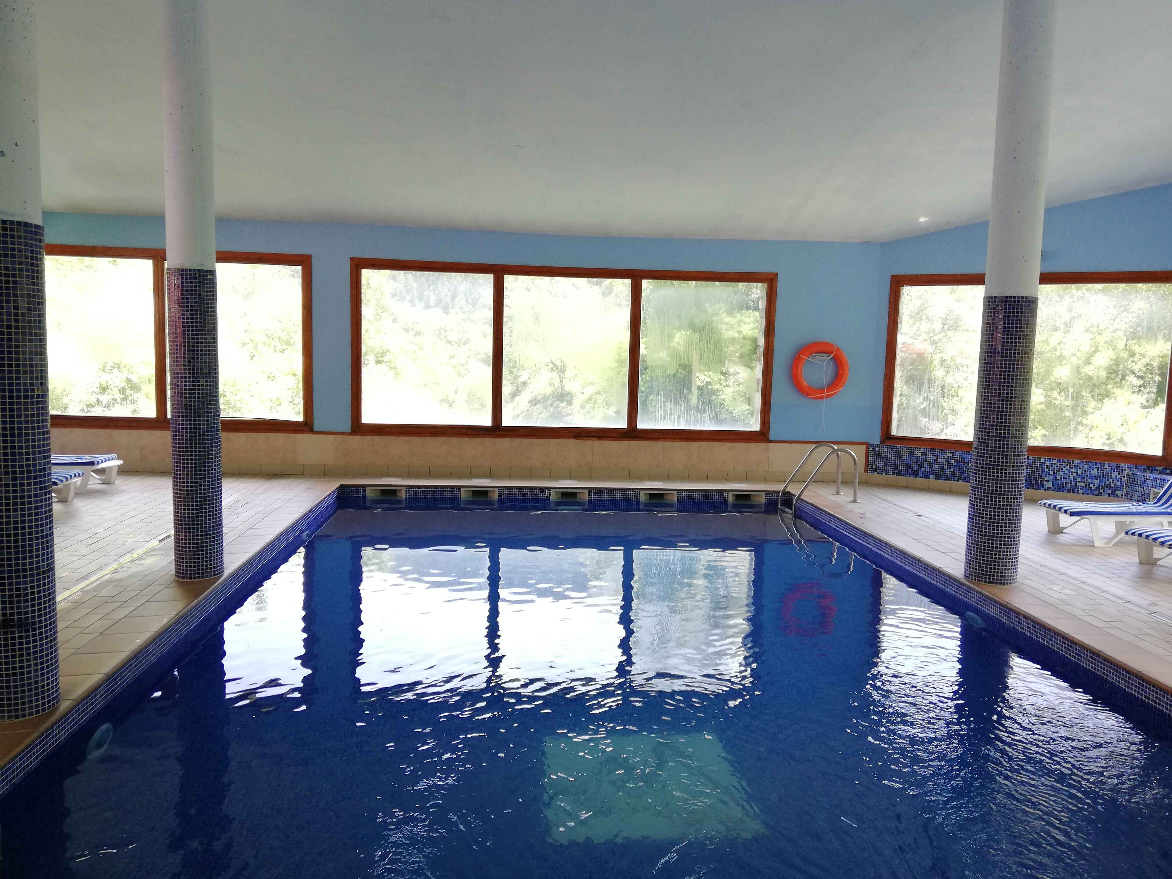 indoor pool, outdoor pool, open 8:00 am to 8:00 pm, pool loungers