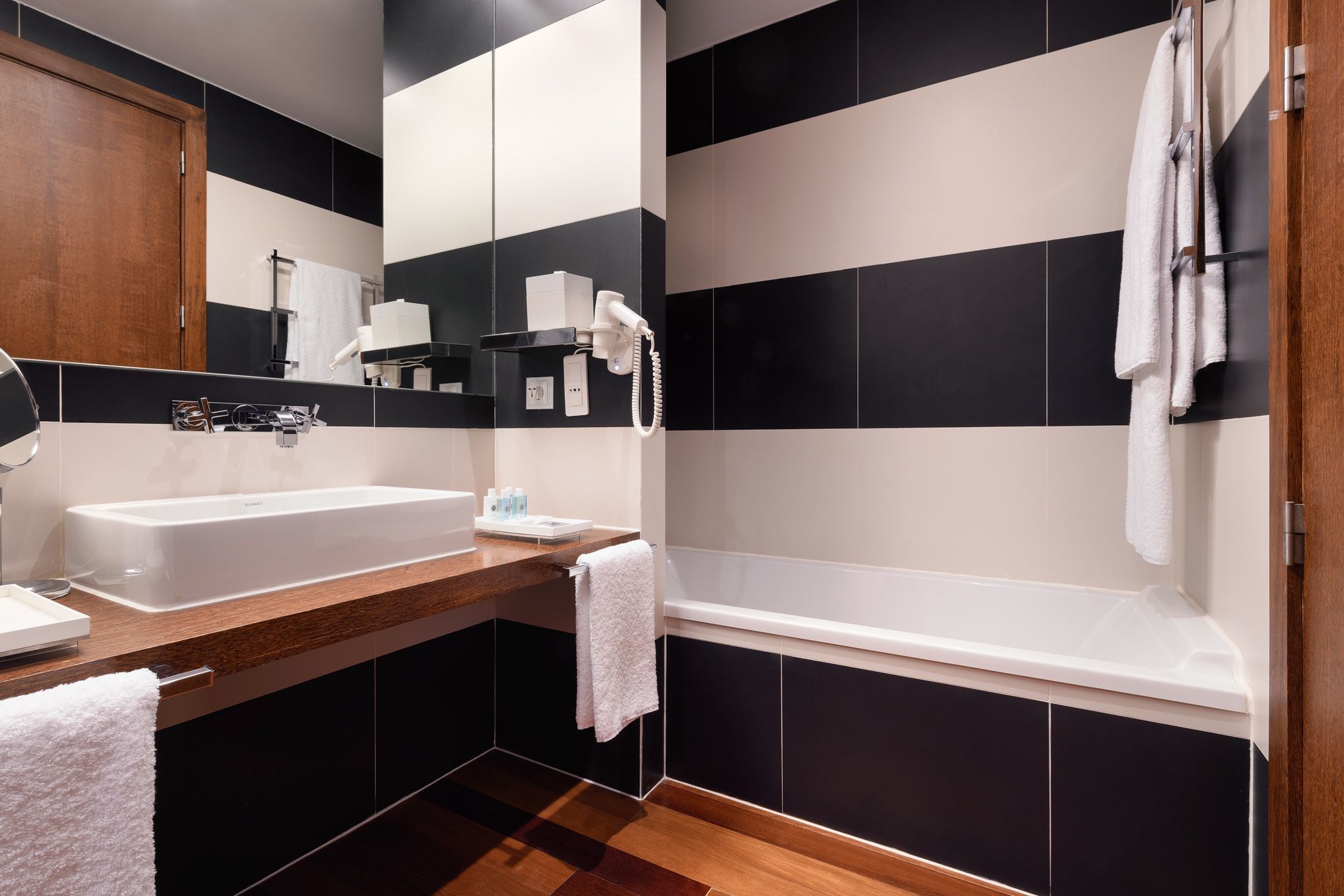 combined shower/bathtub, free toiletries, hair dryer, bathrobes