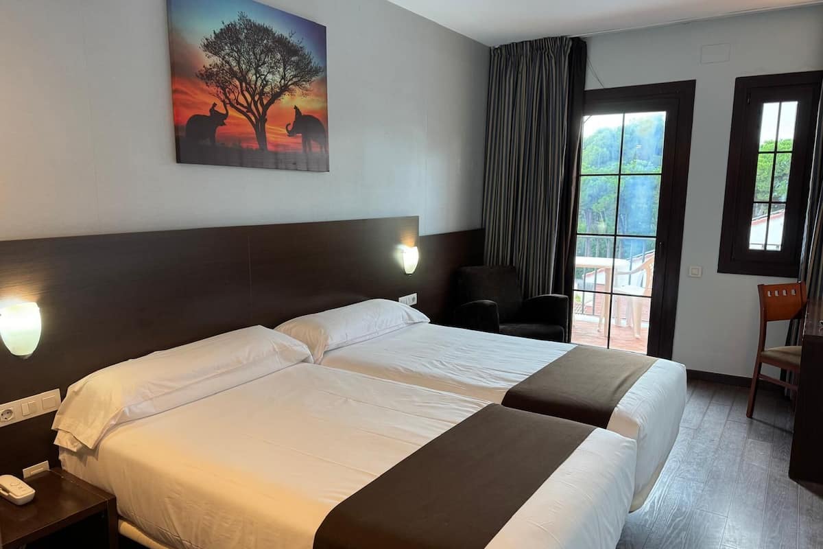 Chambre Confort avec lits jumeaux | Literie de qualité, lit avec matelas en mousse à mémoire