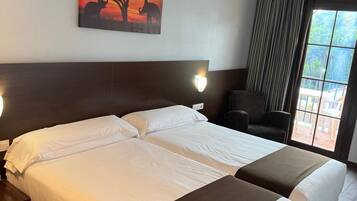 Premium bedding, memory-foam beds, individually furnished, desk