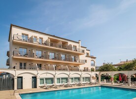 Outdoor pool, open 9:00 AM to 8:30 PM, pool umbrellas, sun loungers