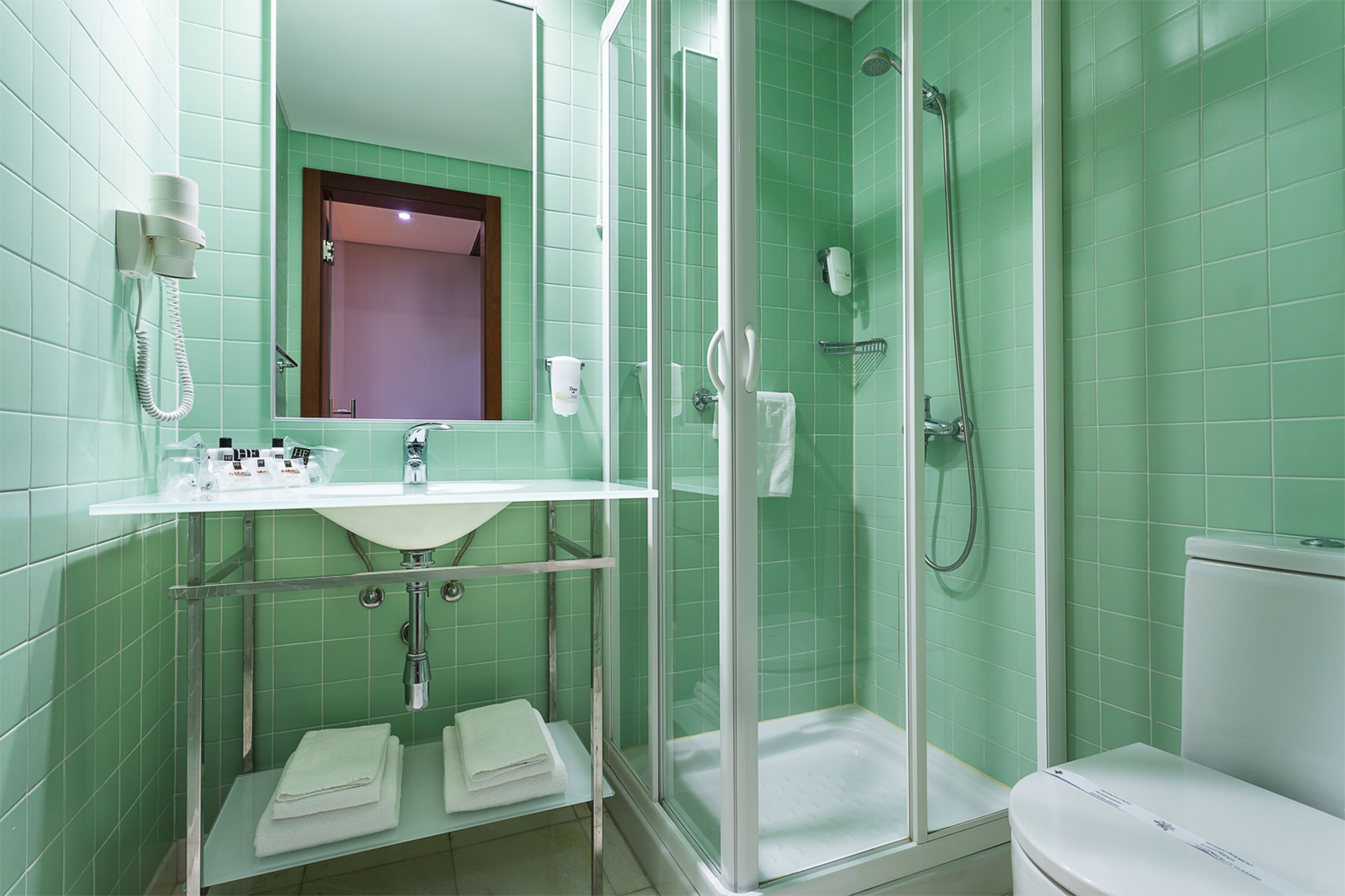 free toiletries, hair dryer, towels