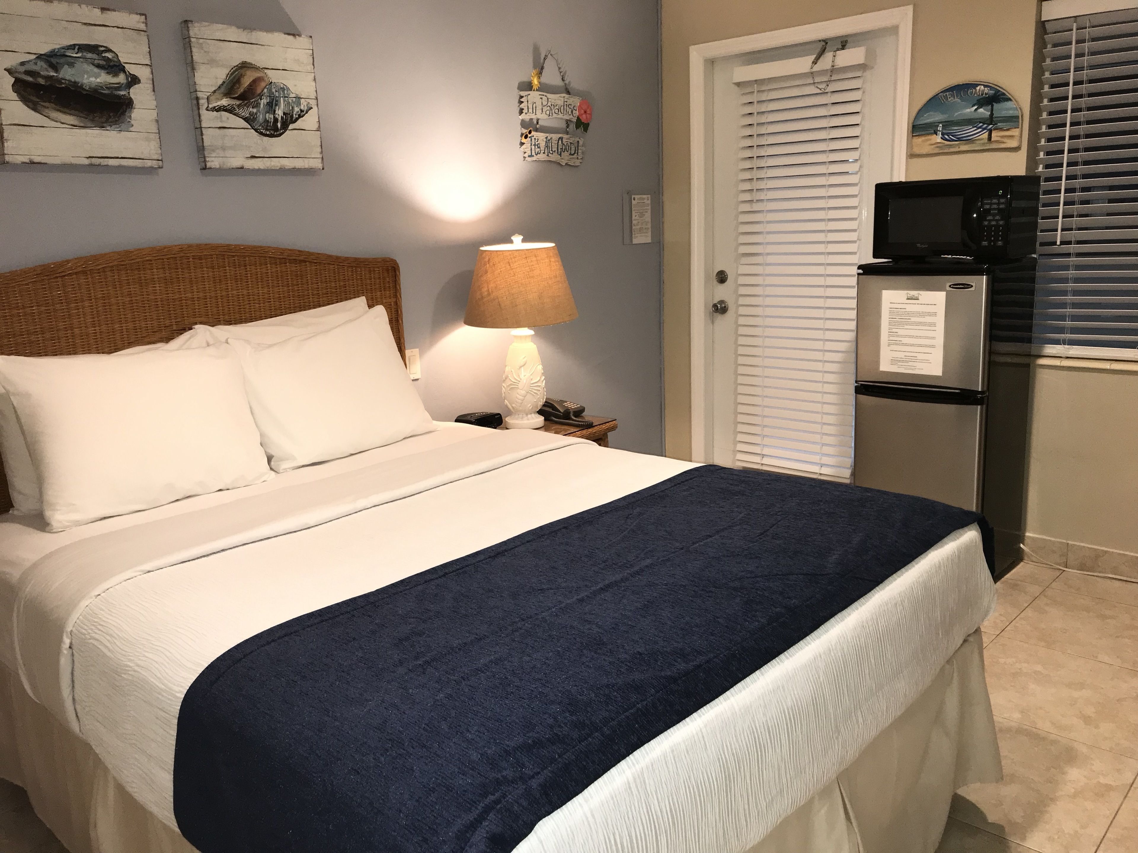 number 16 small hotel room queen bed | 1 bedroom, in-room safe, individually decorated, individually furnished