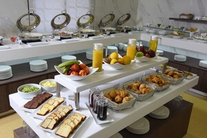 Daily buffet breakfast (USD 11 per person)