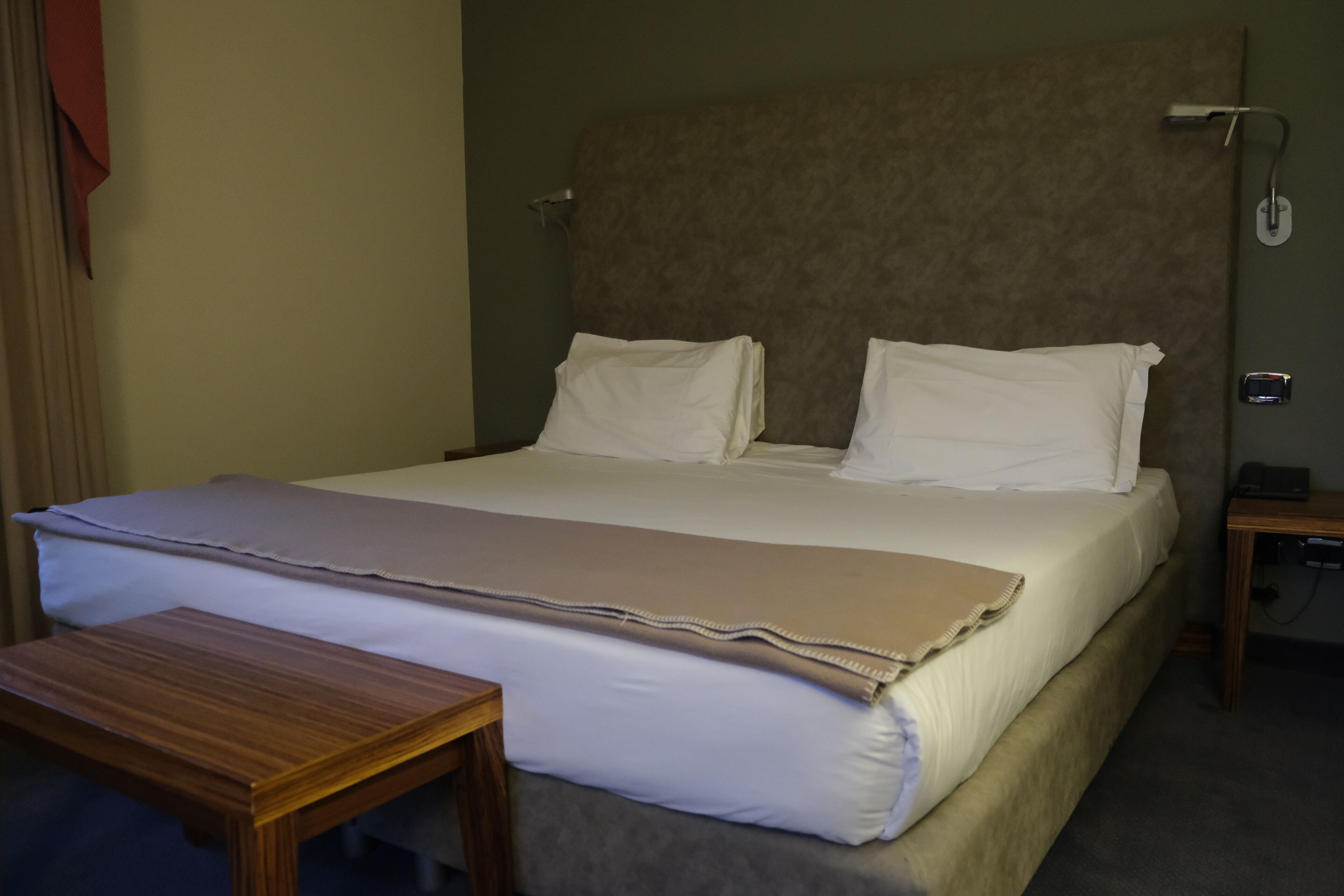 deluxe room | memory-foam beds, minibar, in-room safe, individually decorated