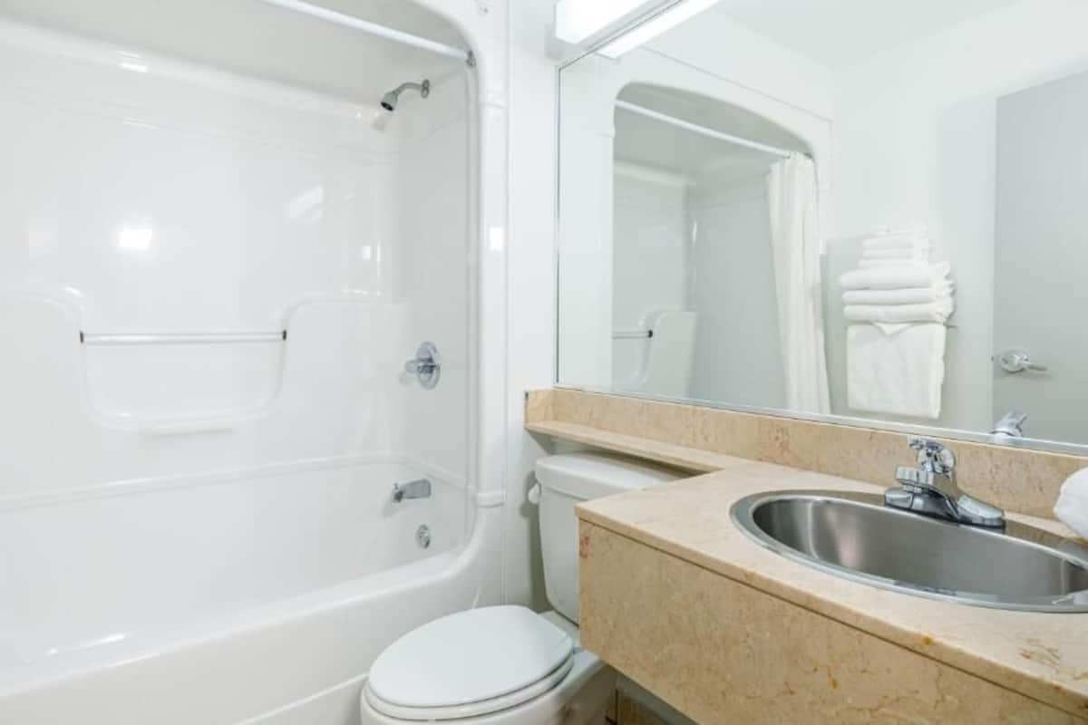 Eco-friendly toiletries, hair dryer, towels, soap