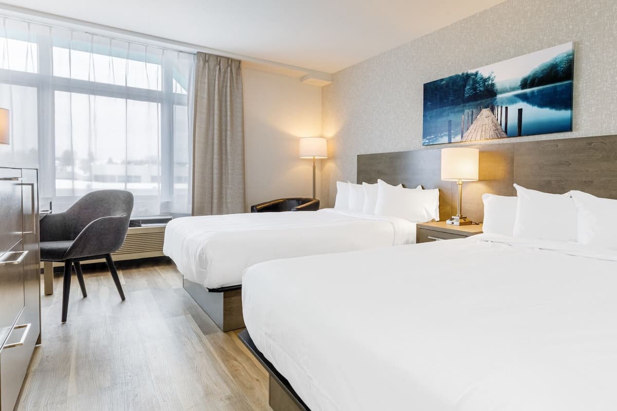 Habitación superior, 2 camas Queen size | Escritorio, cortinas blackout y insonorización