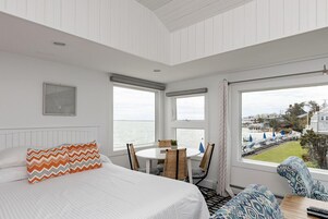 Waterfront Penthouse | Premium bedding, blackout drapes, iron/ironing board, free WiFi
