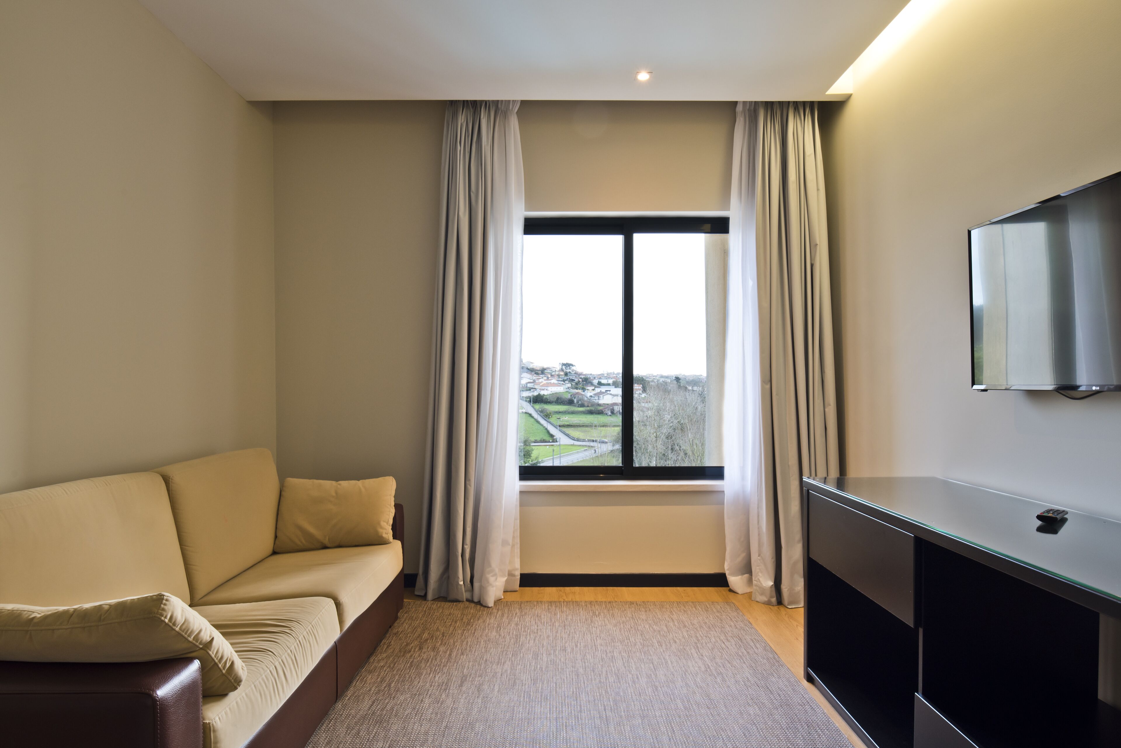 suite, 1 queen bed with sofa bed | living area | led tv, table football, ping pong