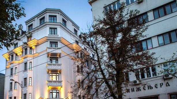 A hotel with a classical facade, multiple balconies, and flags. - Mercure Belgrade Excelsior (Belgrade)