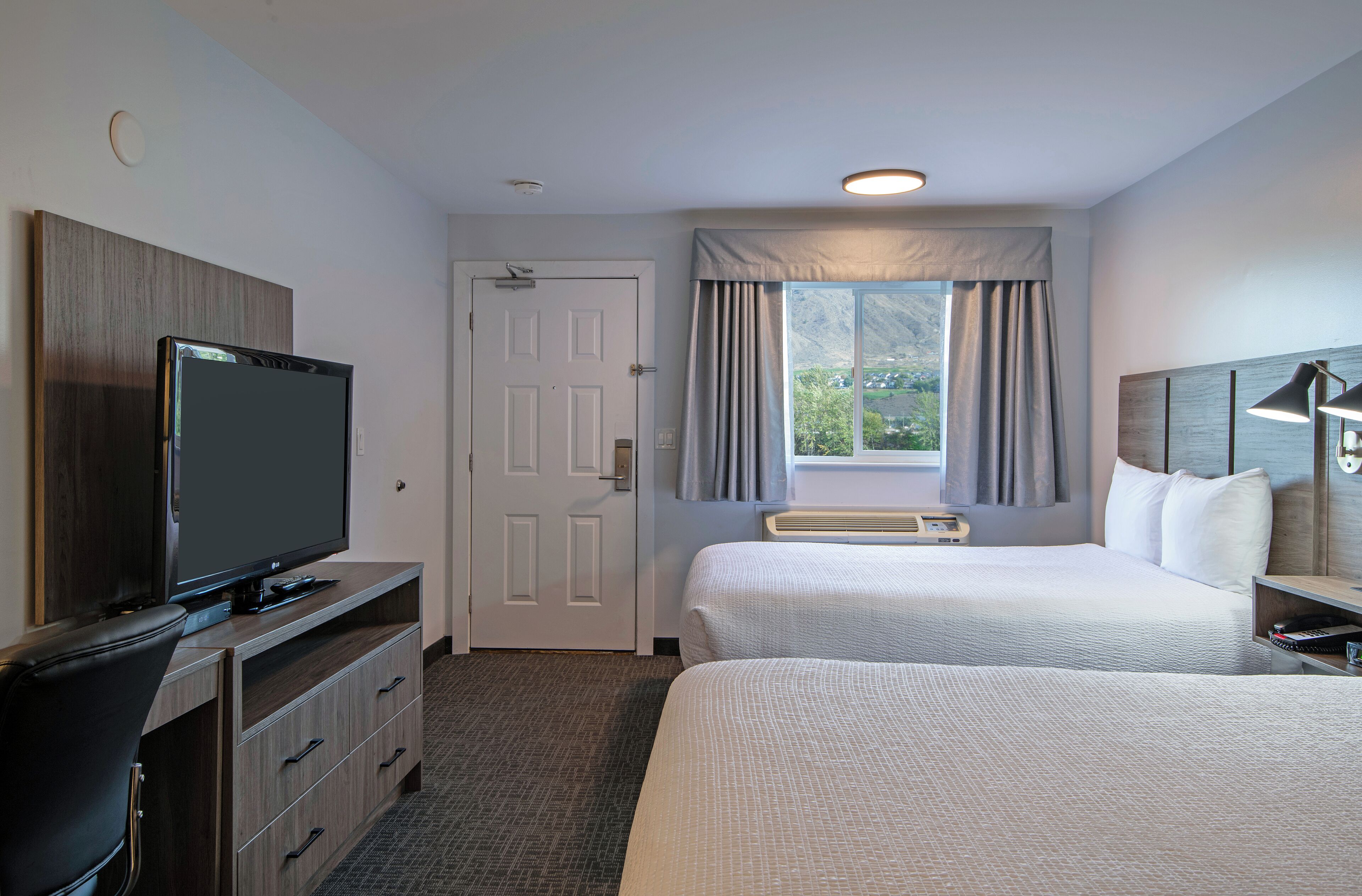 Room, 2 Queen Beds, Kitchenette, River View | Iron/ironing board, free WiFi, bed sheets