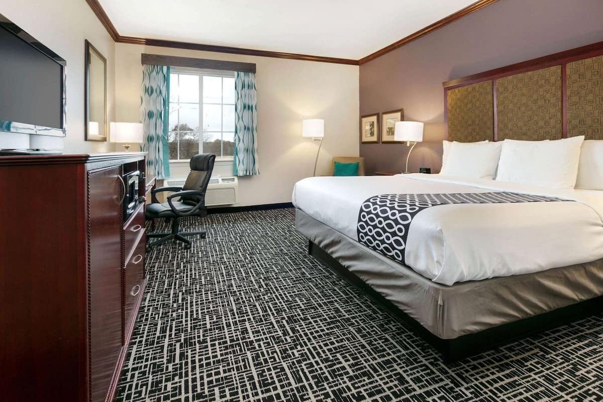 Premium bedding, desk, blackout curtains, iron/ironing board