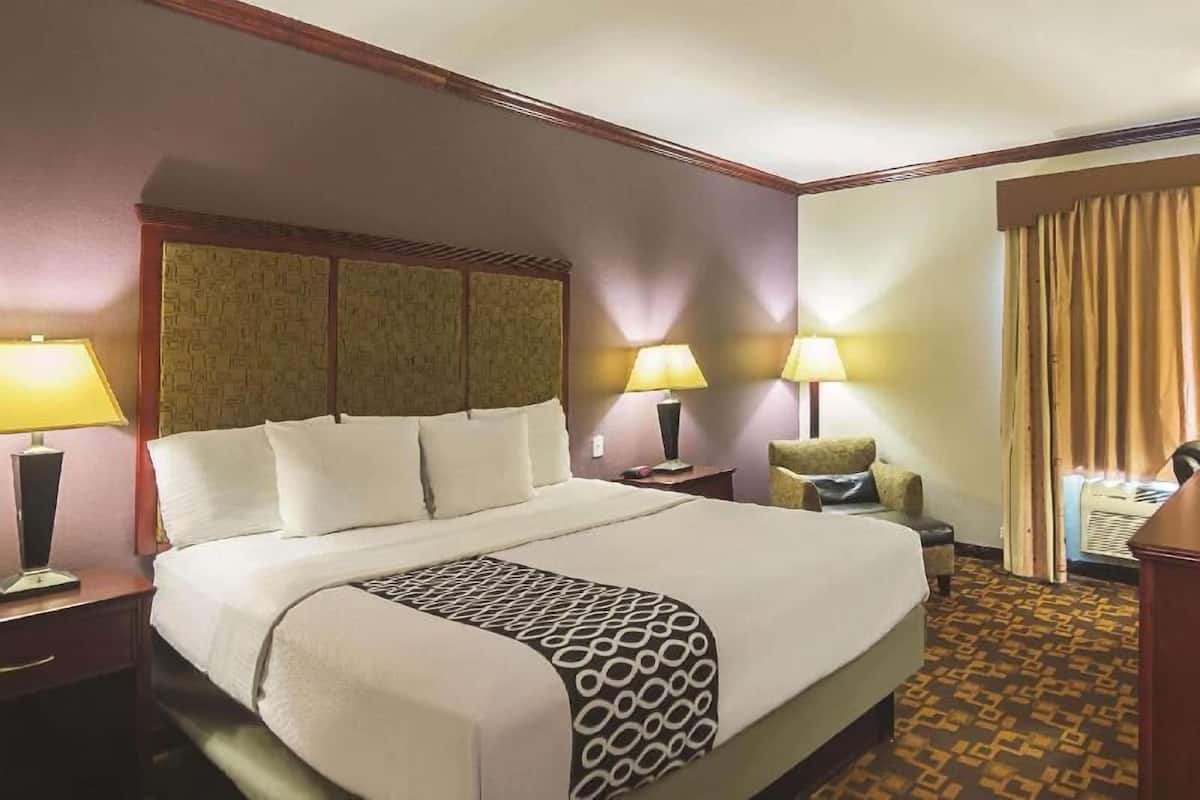 Premium bedding, desk, blackout curtains, iron/ironing board