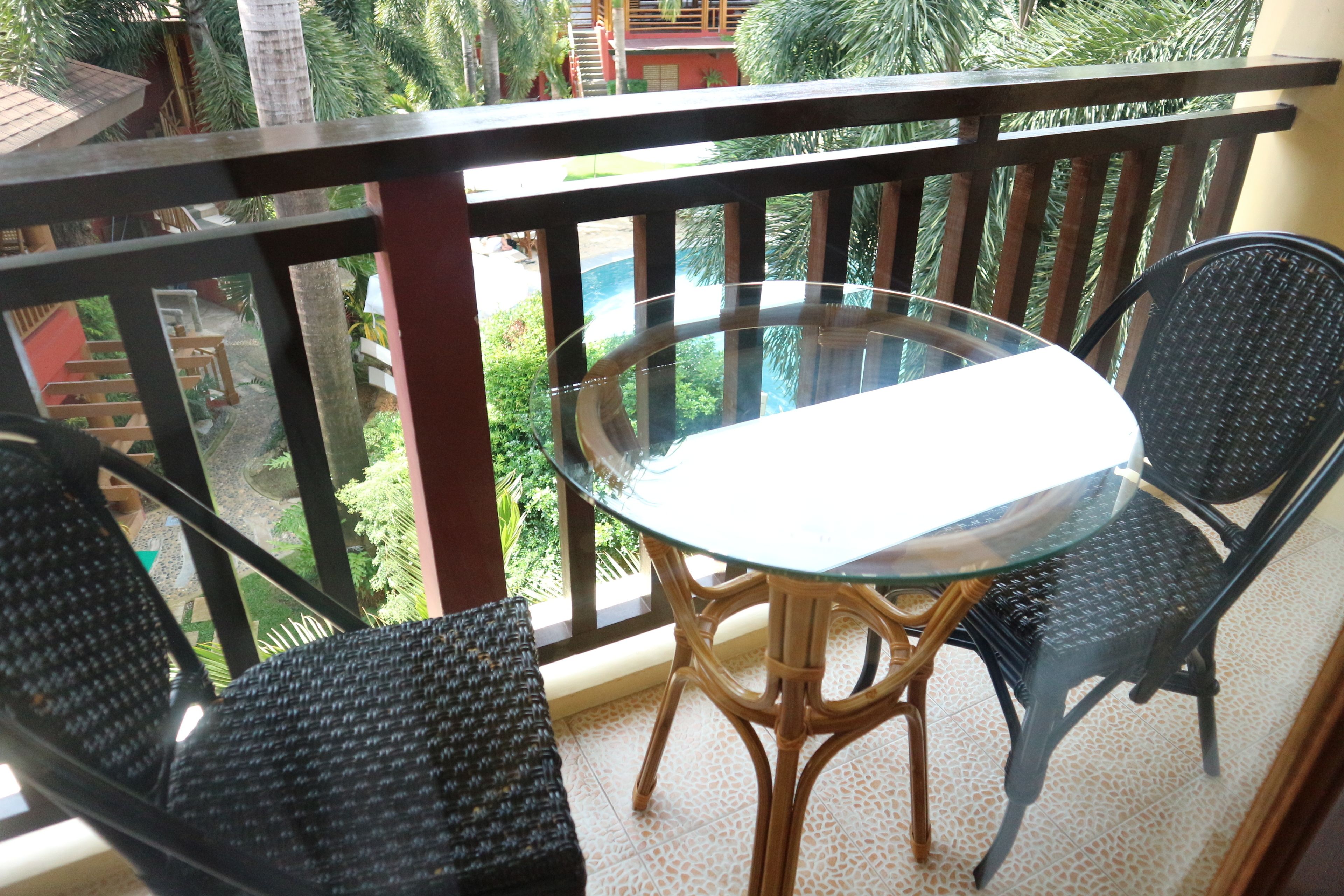 deluxe room, 2 queen beds, non smoking, garden view | balcony
