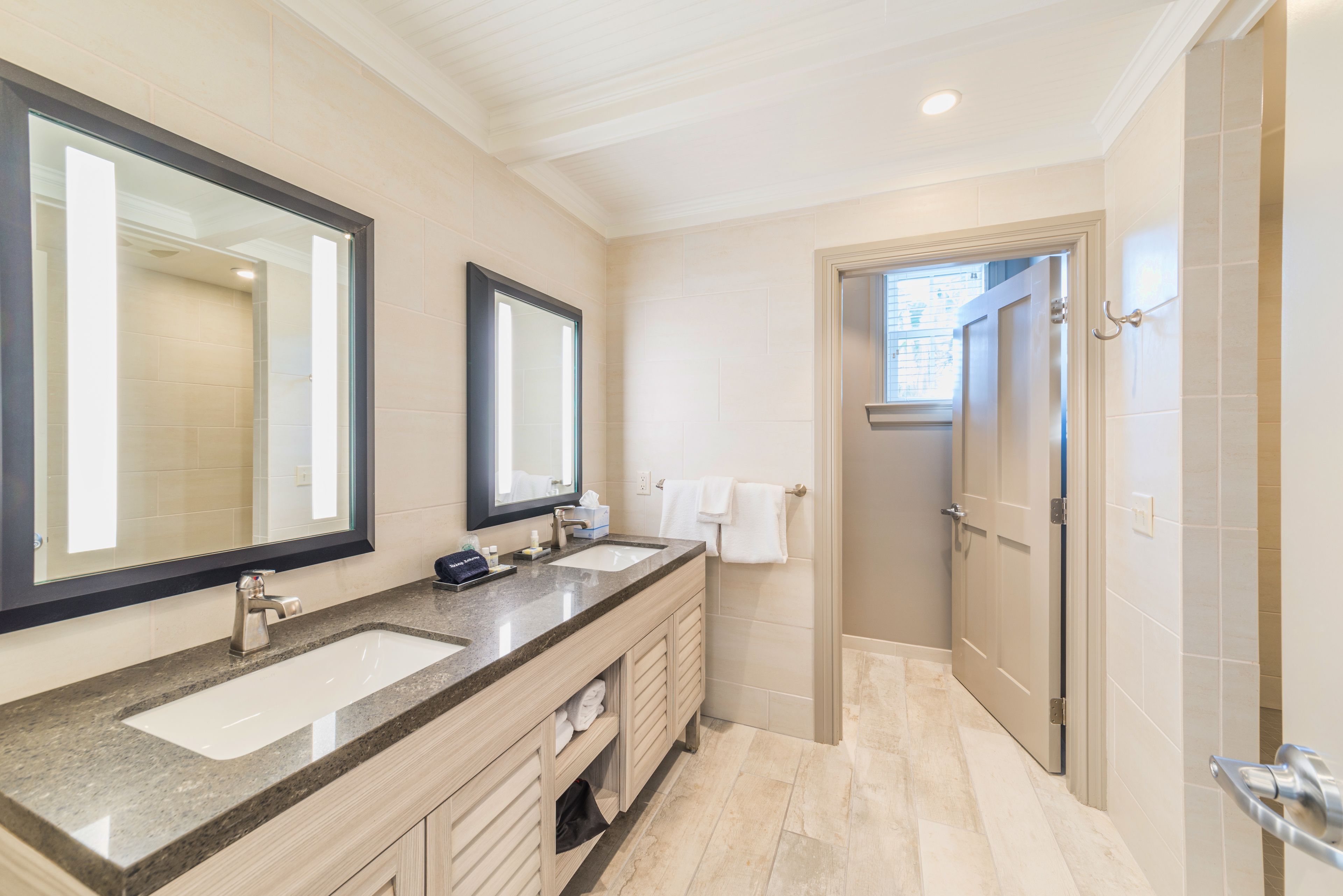 designer toiletries, hair dryer, bathrobes, towels