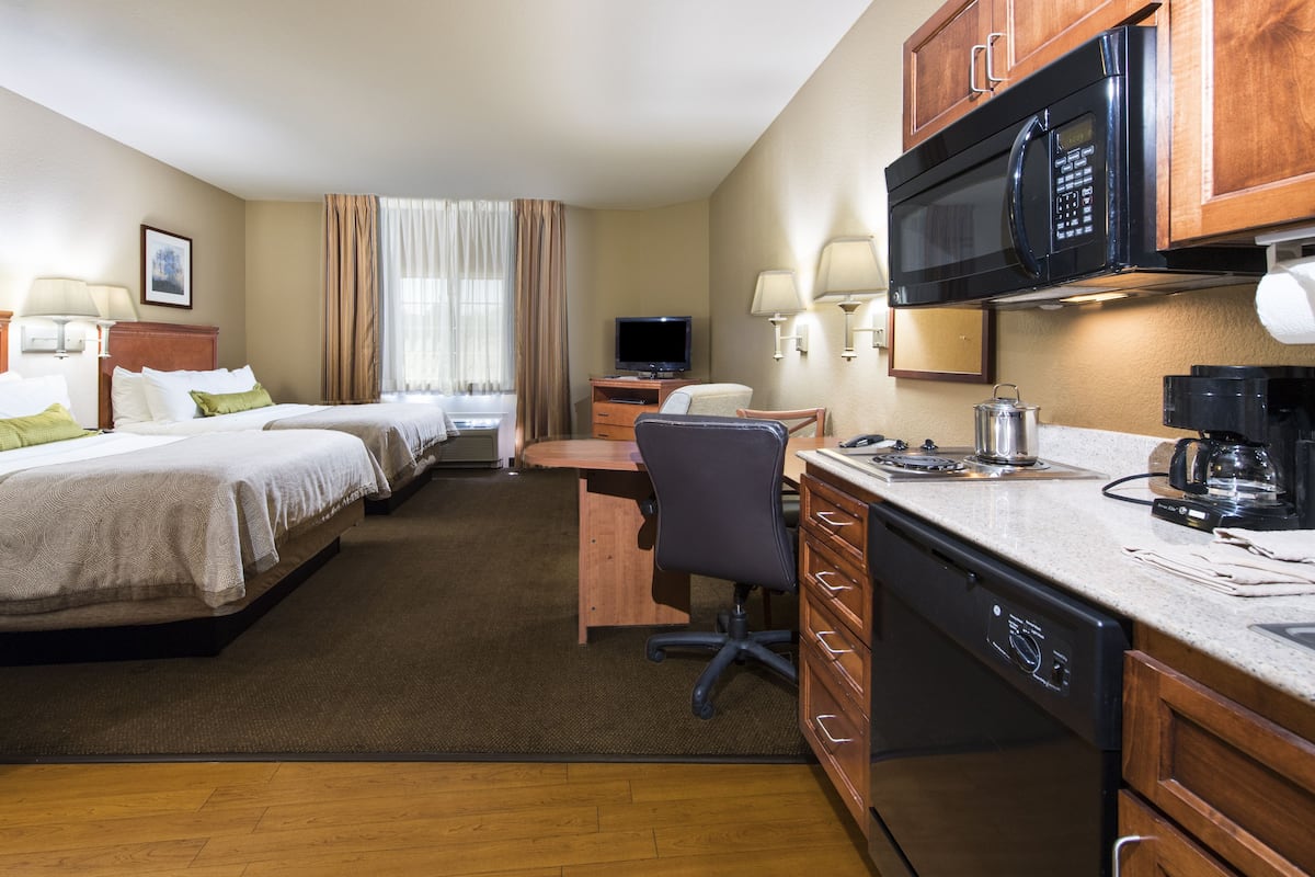 studio suite, 2 double beds | private kitchen | full-sized fridge, microwave, stovetop, dishwasher