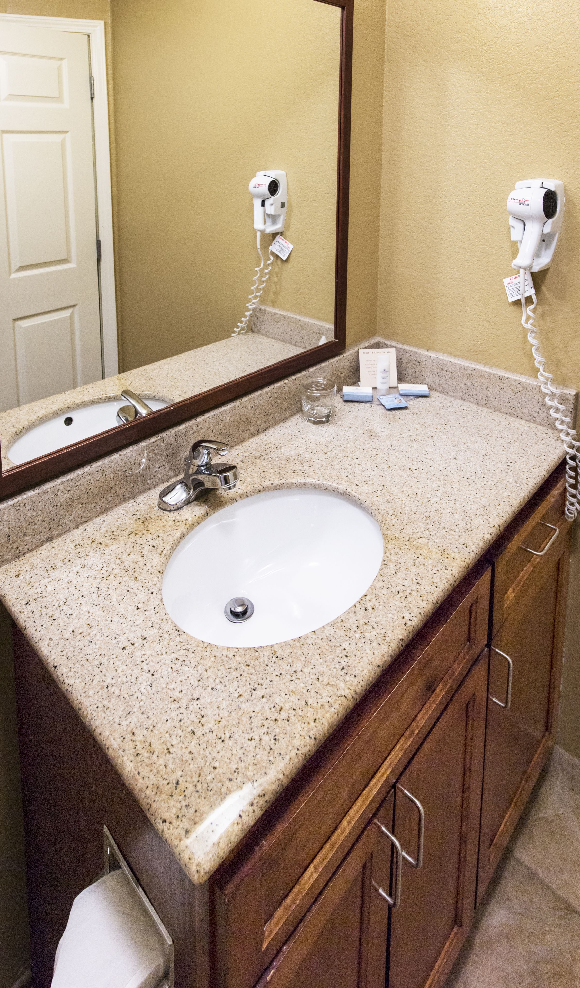 standard suite | bathroom | hair dryer, towels