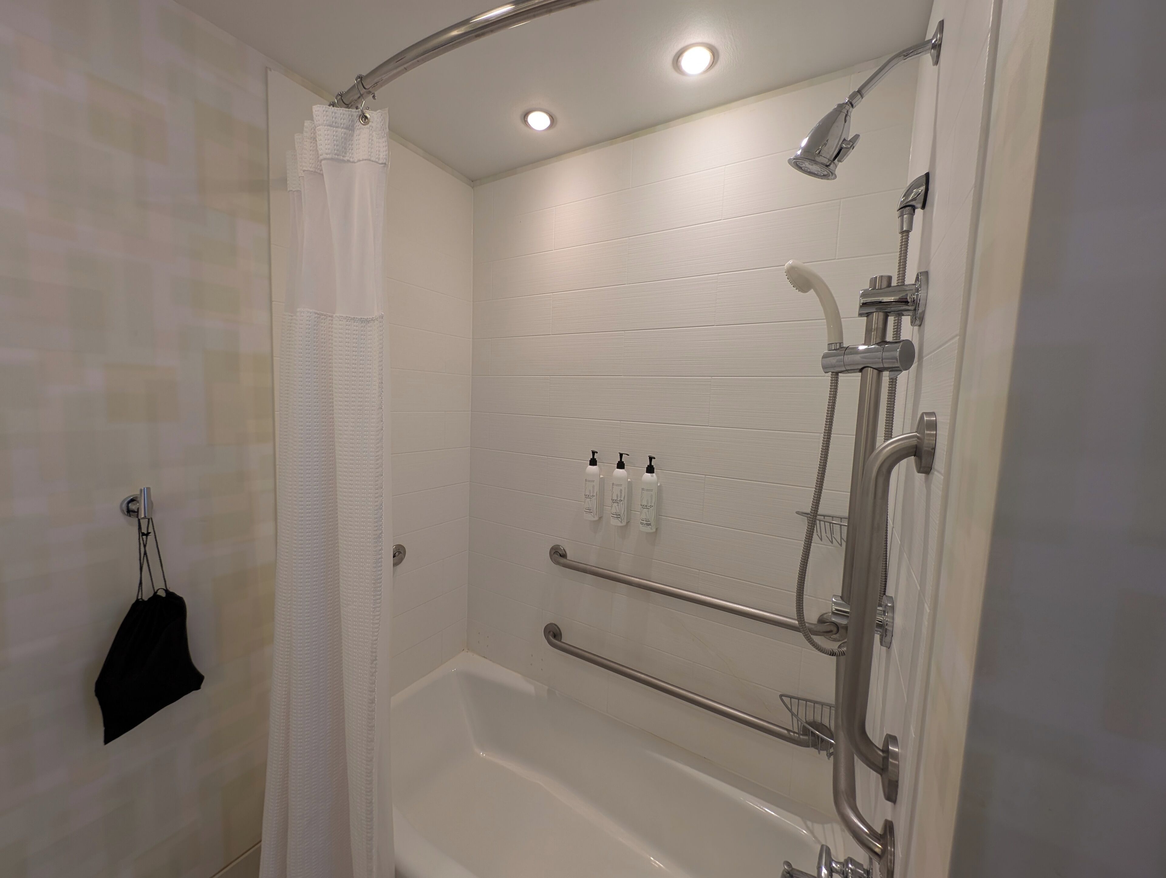 combined shower/bathtub, free toiletries, hair dryer, towels