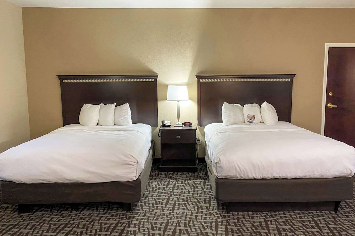 Queen Suite Deluxe | Egyptian cotton sheets, premium bedding, down comforters, pillowtop beds