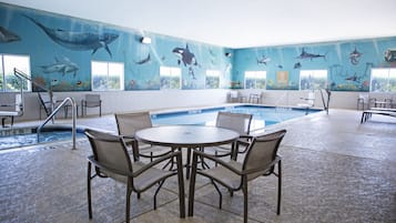 Indoor pool, open 10:00 AM to 10:00 PM, pool loungers