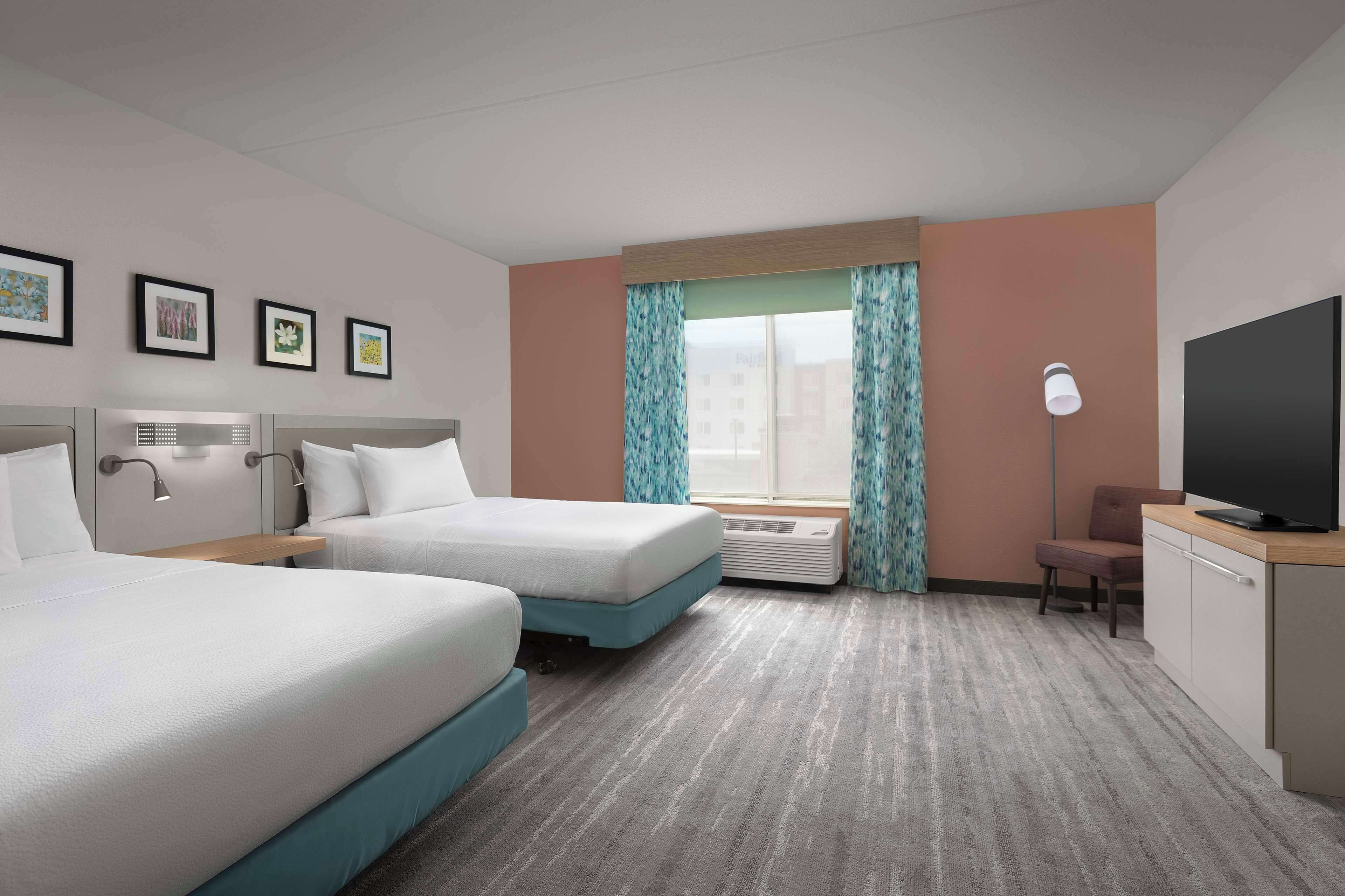 garden suite, 2 queen beds, mobility/hearing accessible, roll-in shower | premium bedding, in-room safe, desk, iron/ironing board