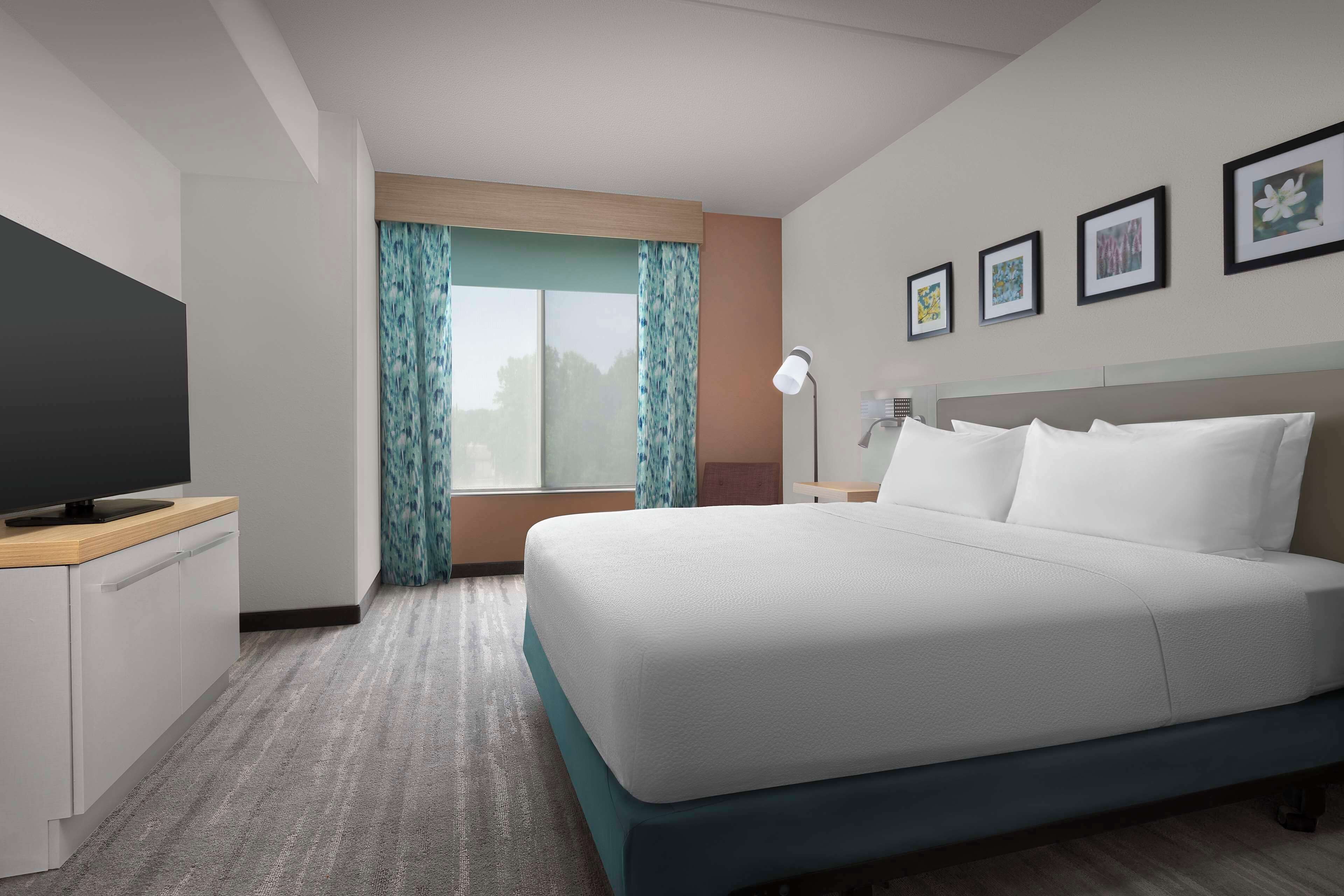 junior suite, 1 king bed | premium bedding, in-room safe, desk, iron/ironing board