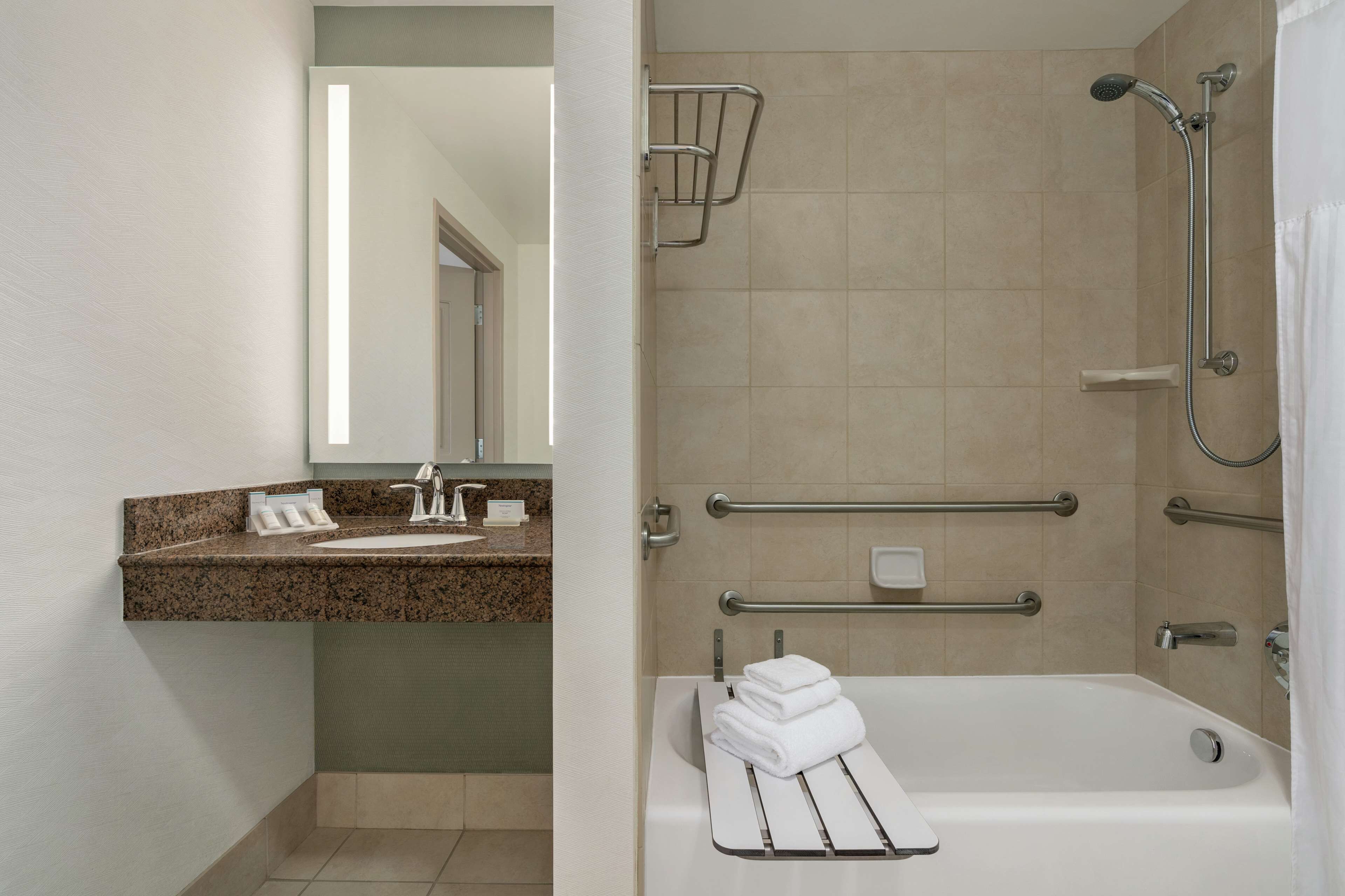 combined shower/bathtub, hair dryer, bathrobes, towels