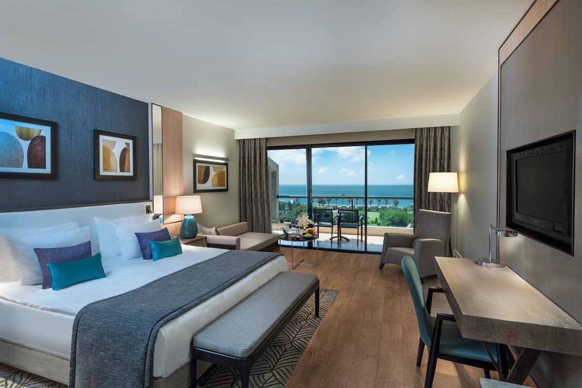 Deluxe Room with Side Sea View | Egyptian cotton sheets, premium bedding, Select Comfort beds, minibar