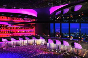 13 bars/lounges, 4 poolside bars, swim-up bar