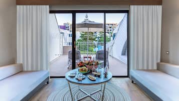Deluxe Superior Pool Access | Living area | 82-cm LCD TV with satellite channels, TV