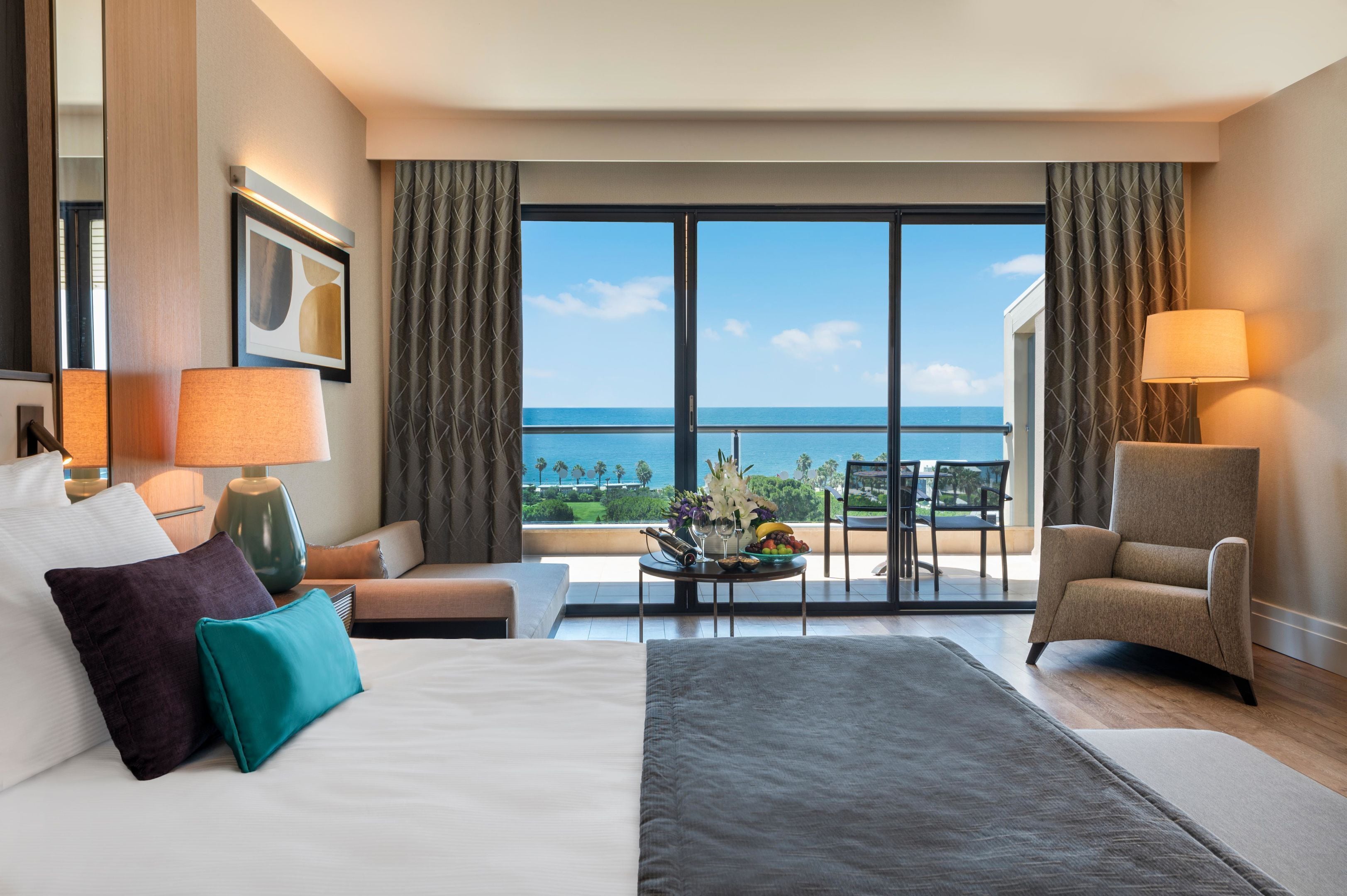 Deluxe Room with Side Sea View | Egyptian cotton sheets, premium bedding, Select Comfort beds, minibar