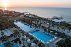 2 indoor pools, 5 outdoor pools, pool umbrellas, pool loungers
