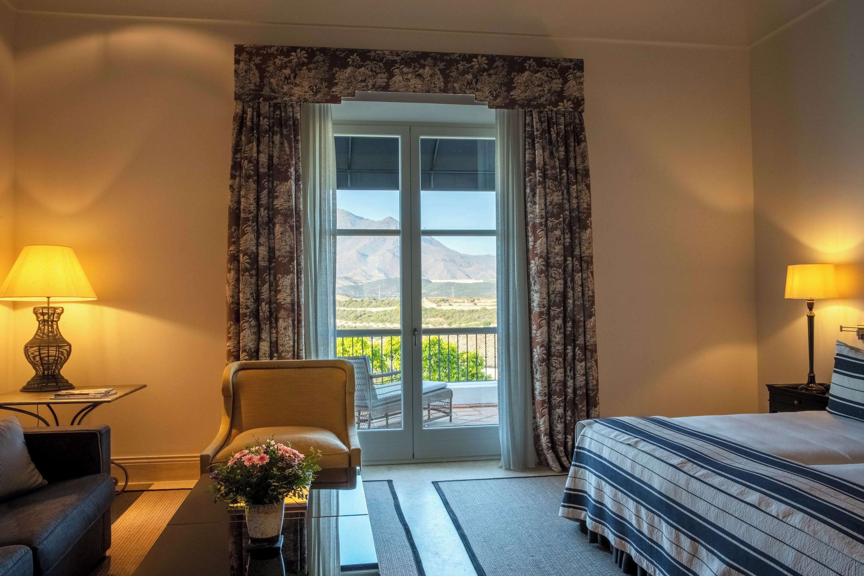 Junior Suite with Mountain View & Spa Access | Egyptian cotton sheets, premium bedding, down comforters, minibar