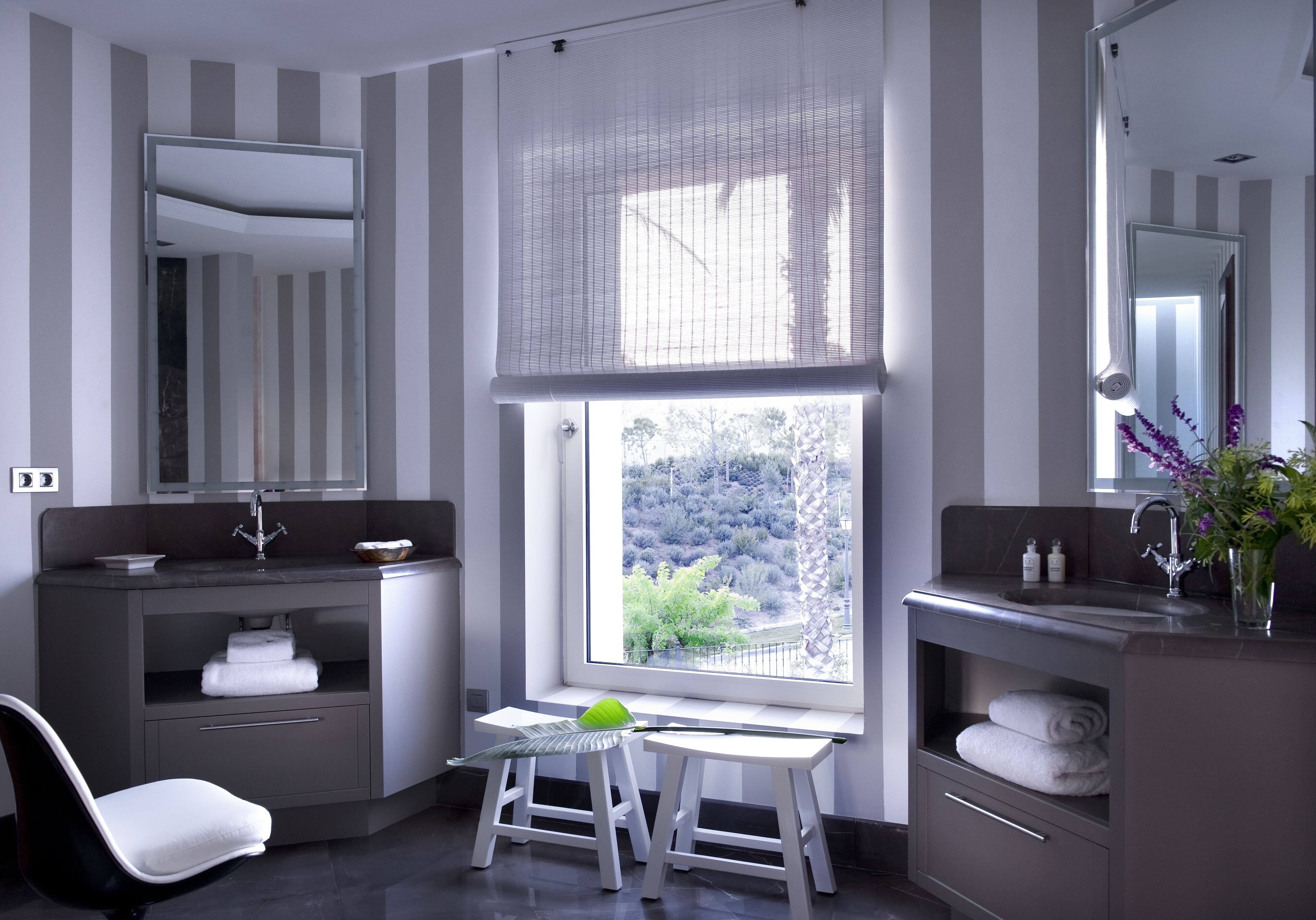 separate bathtub and shower, slippers, towels