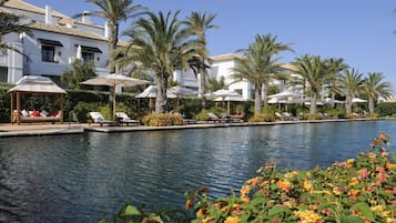 Indoor pool, 3 outdoor pools, open open 24 hours a day, pool umbrellas