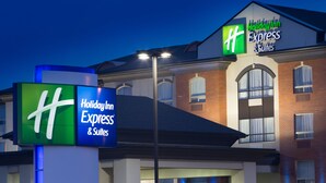 A Holiday Inn Express & Suites building with a prominent 'HH' logo and 'Holiday Inn Express & Suites' signage. - Holiday Inn Express & Suites Slave Lake by IHG (Slave Lake)