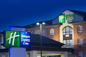 A Holiday Inn Express & Suites building with a prominent 'HH' logo and 'Holiday Inn Express & Suites' signage. - Holiday Inn Express & Suites Slave Lake by IHG (Slave Lake)