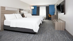 A hotel room with two beds, a TV, a desk, and a chair. - Holiday Inn Express Hotel & Suites SWIFT CURRENT by IHG (Swift Current)