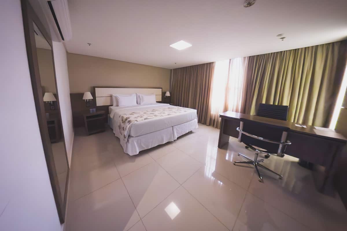 Deluxe Double Room | 1 bedroom, minibar, in-room safe, desk