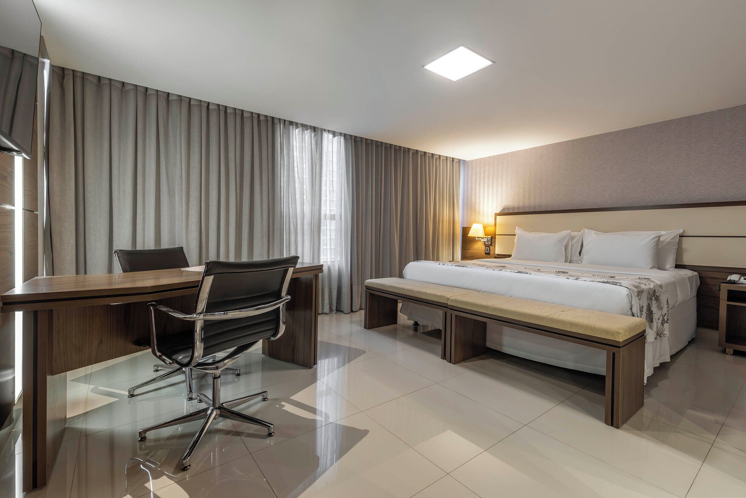 Suite Deluxe, 1 cama King size | Minibar, caja de seguridad en la habitación, escritorio y wifi gratis 