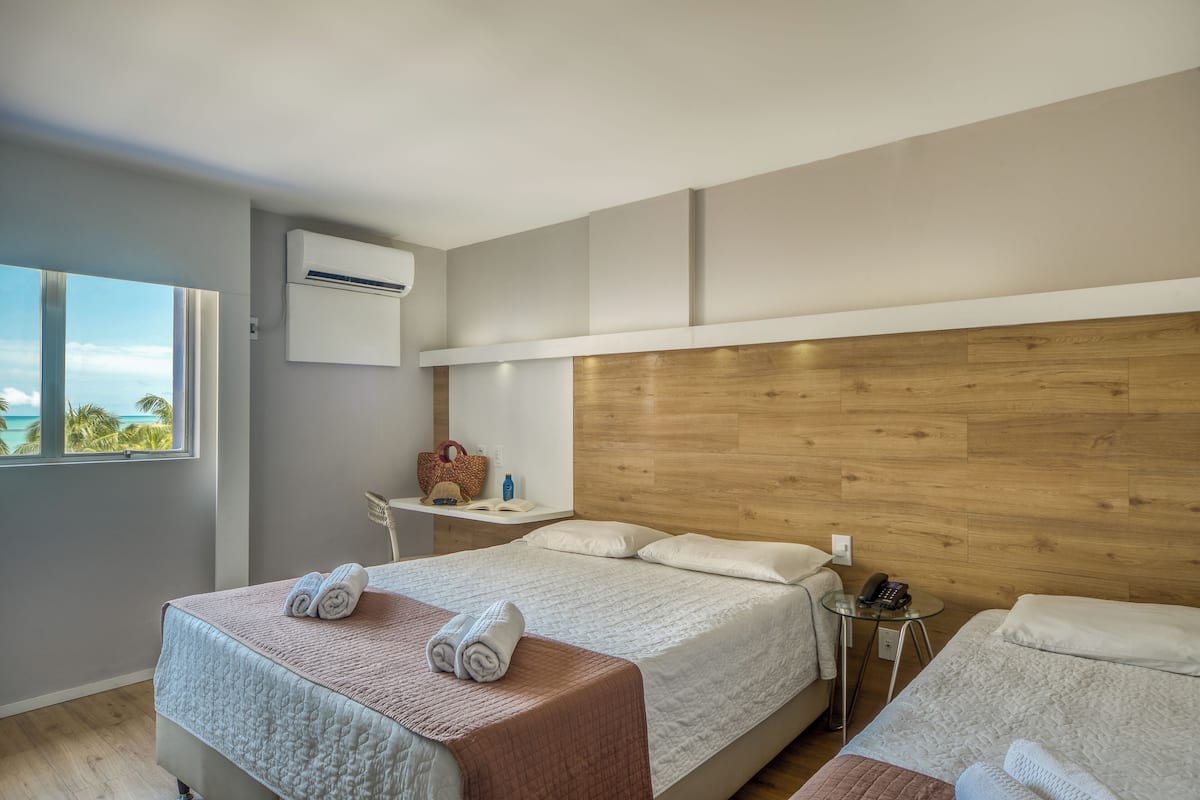 Premium com Vista Mar Casal + 1 | Biancheria da letto di alta qualità, una cassaforte in camera