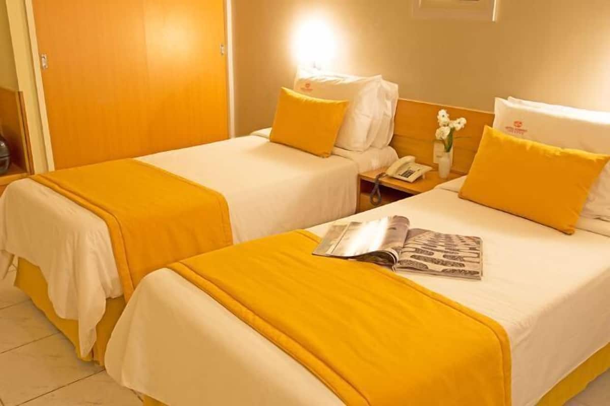 Hypo-allergenic bedding, minibar, in-room safe, soundproofing