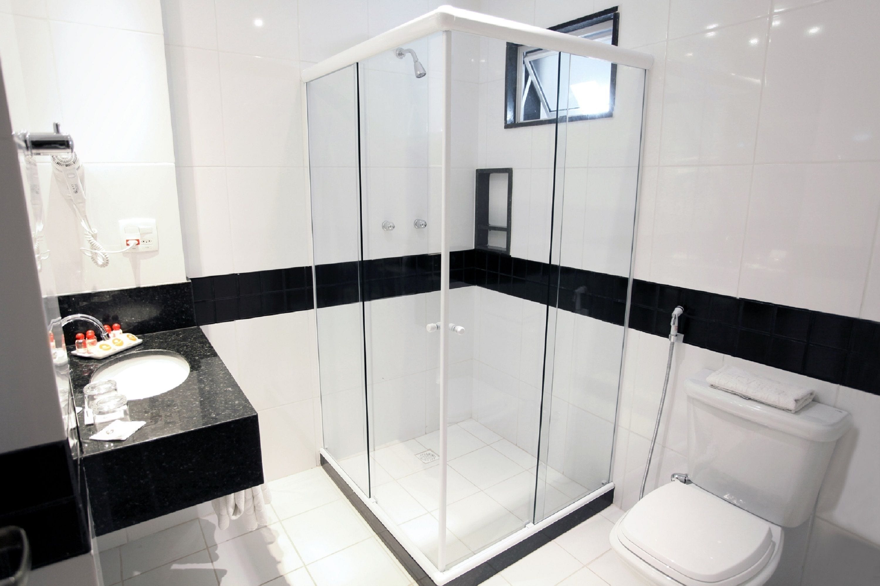 shower, free toiletries, hair dryer, towels