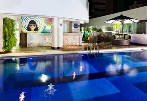 Indoor pool, 2 outdoor pools, open 10:00 AM to 10:00 PM, pool umbrellas