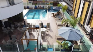 Indoor pool, 2 outdoor pools, open 10:00 AM to 10:00 PM, pool umbrellas