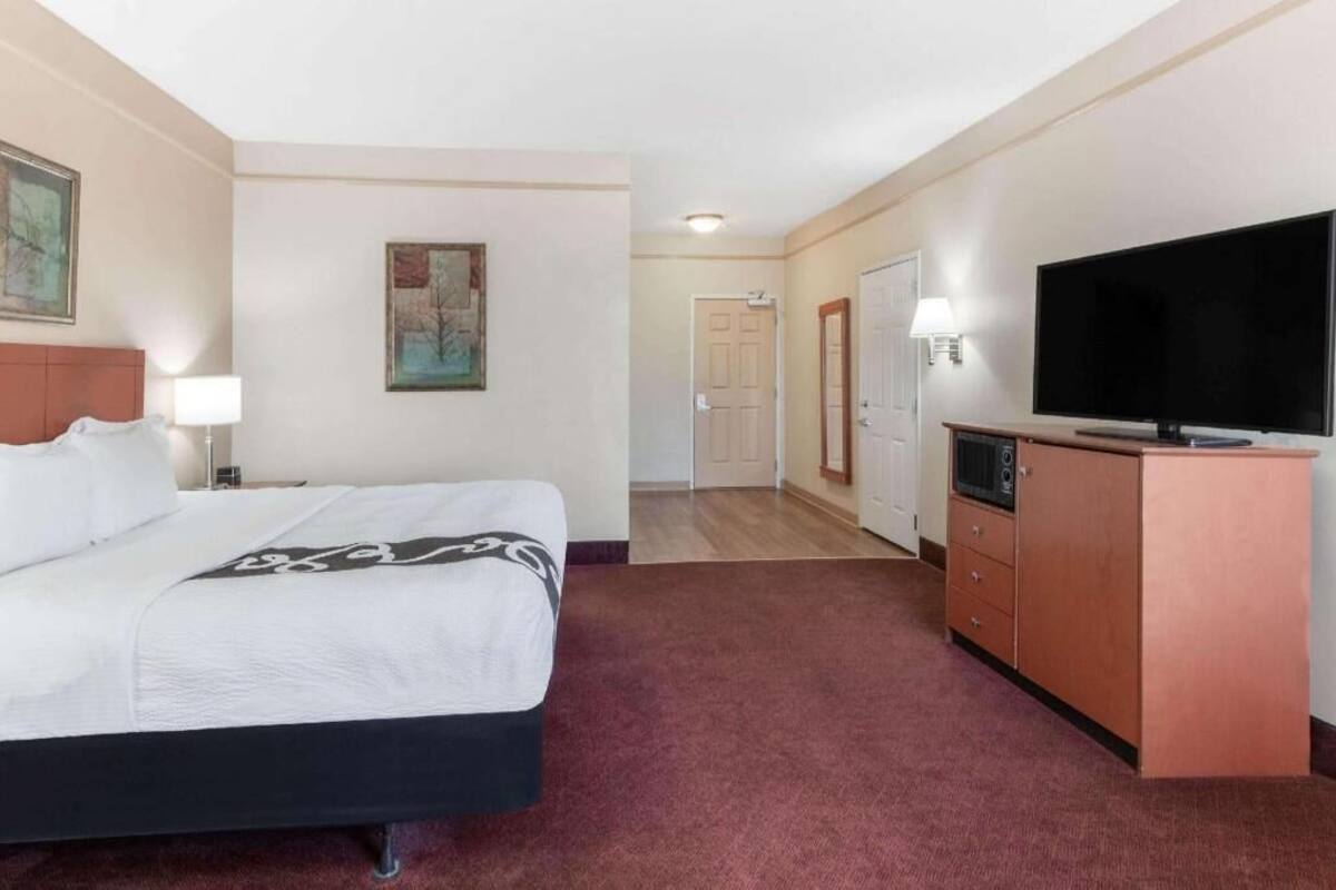 Premium bedding, desk, blackout curtains, iron/ironing board