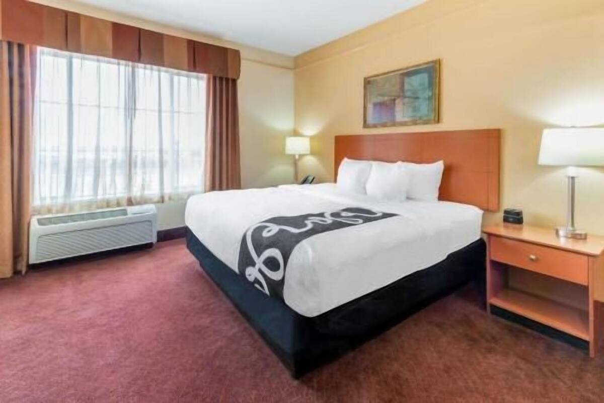 Premium bedding, desk, blackout curtains, iron/ironing board